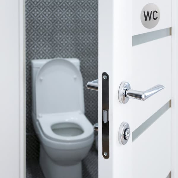 sett med 4 selvklebende WC-skilt