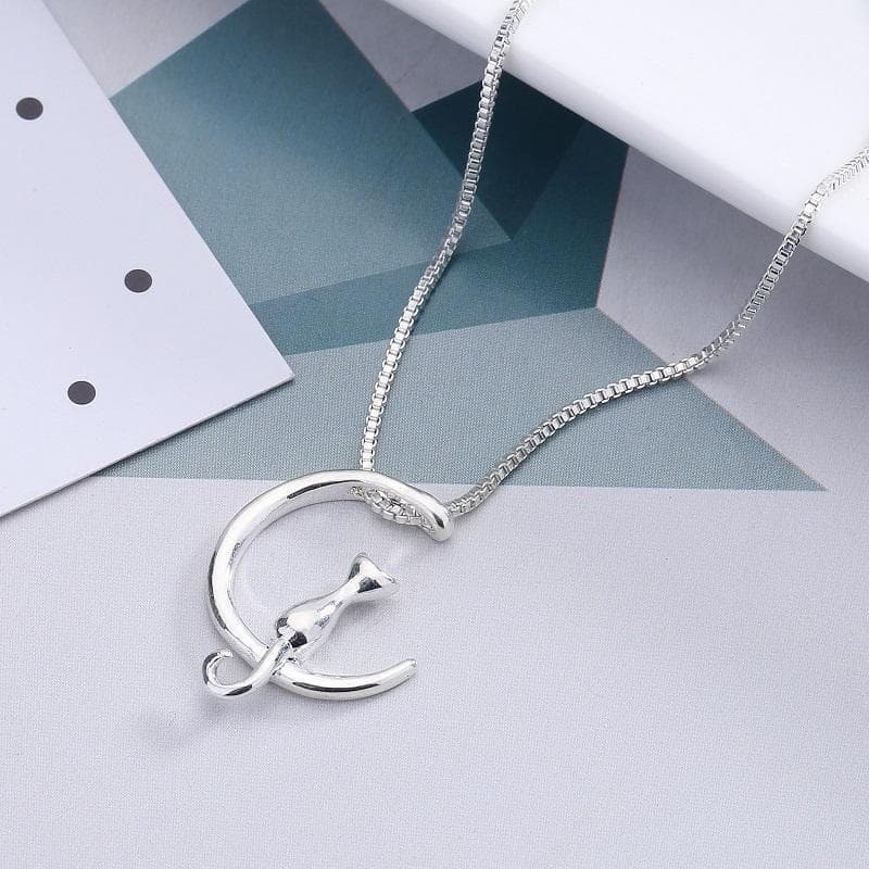Halsband måne med katt i både silver och guld