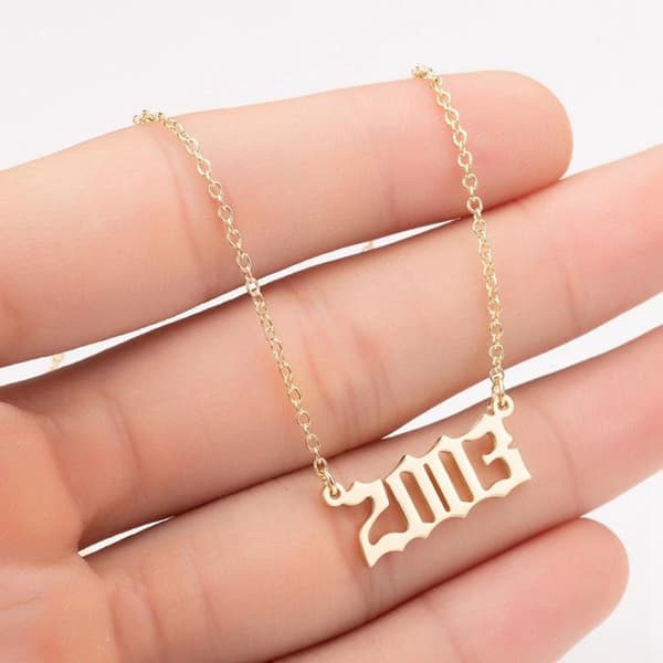 Guldpläterat halsband kedja årtal 2003 unisex cool unik