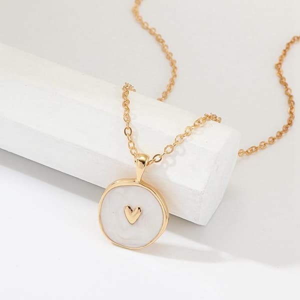 Beautiful handmade necklace with enamel in with moon, flash & heart