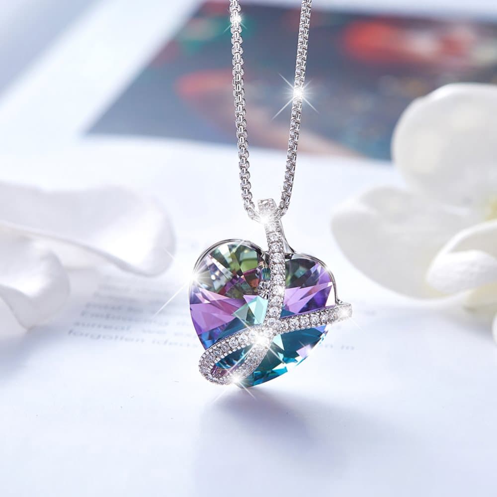 Silverhalsband med lila/grön hjärta
