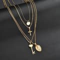 Miniatyrbild 3 av 5: Guld Halsband / Choker med 4 olika Kedjor, Kors & Nyckel