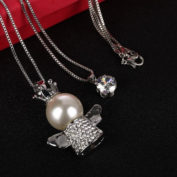 Halsband i Silver färg med Ängel med kristaller/pärla