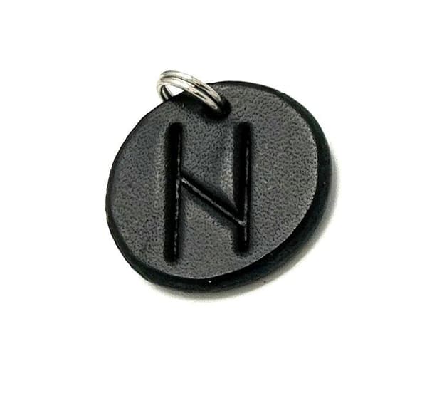 Handmade pendant with nordic rune made of swedish leather