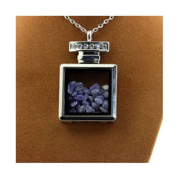Stenar och mineraler. Rå tanzanit halsband. Flaskmodell.