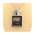 Miniatyrbild 3 av 3: Stenar och mineraler. Rå safir halsband. Flaskmodell.
