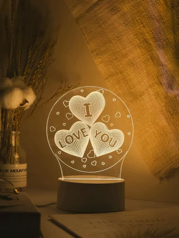 En lille gave til VALENTINE'S DAY 3D-lampen med inskriptionen I LOVE YOU på USB 3 MODES