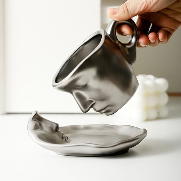 Tekopp med fat - Ansikte - Silver