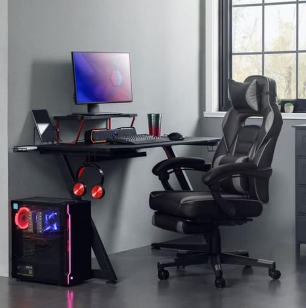 Rootz Gaming tuoli - Työtuoli - Kääntyvä tuoli - Jalkatuki - Niskatuki - Ristiselän pehmuste - Ergonominen - Korkeussäädettävä - Musta - 67 x 66 x (11