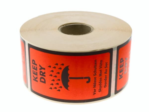 Etiketter med text: Keep Dry150x75x150mm 1,385kg (1st)