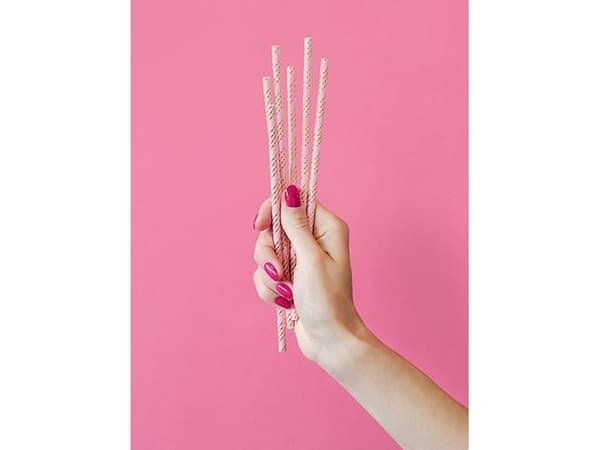 Sugrör av papper rosa, guldränder