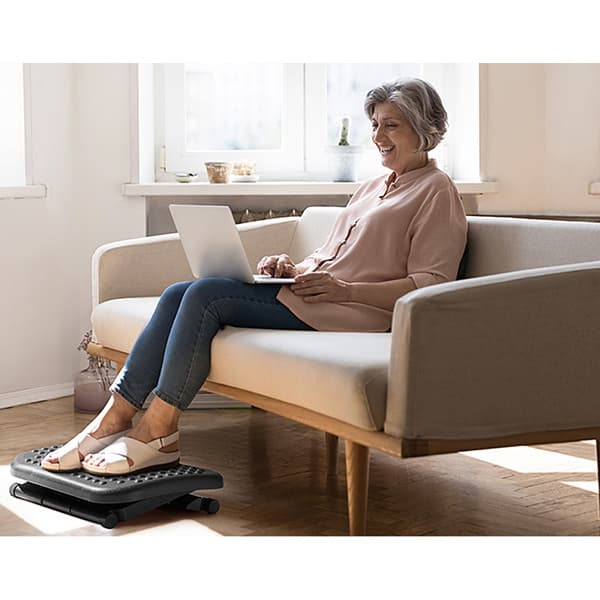 Huanuo höj- och sänkbart fotstöd med massagefunktion