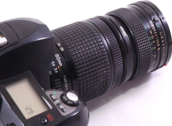 KiwiFotos Adapterring för omvänd montering 49mm-52mm