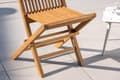 Miniatyrbillede 5 af 5: FURNLUX UDENDØRS SPISEBORDSSTOL KENYA TEAK 47CM