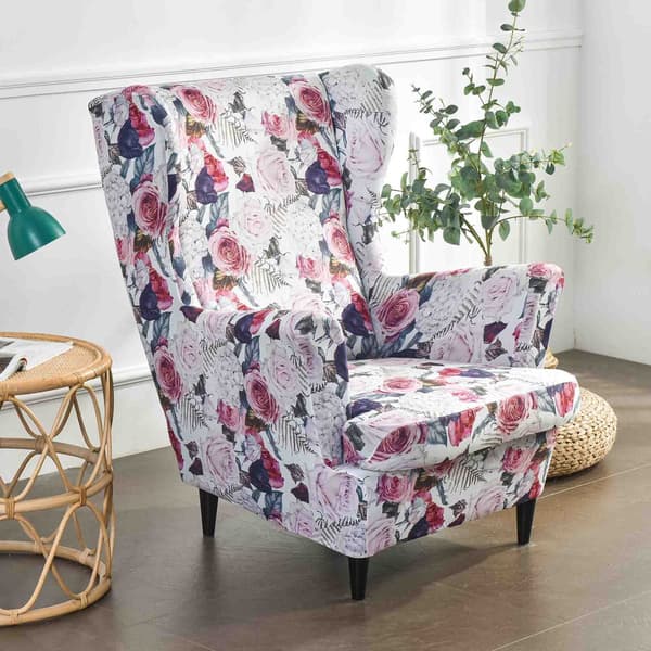 Uszaki-nojatuolin päällinen vaaleanpunaisilla kukilla