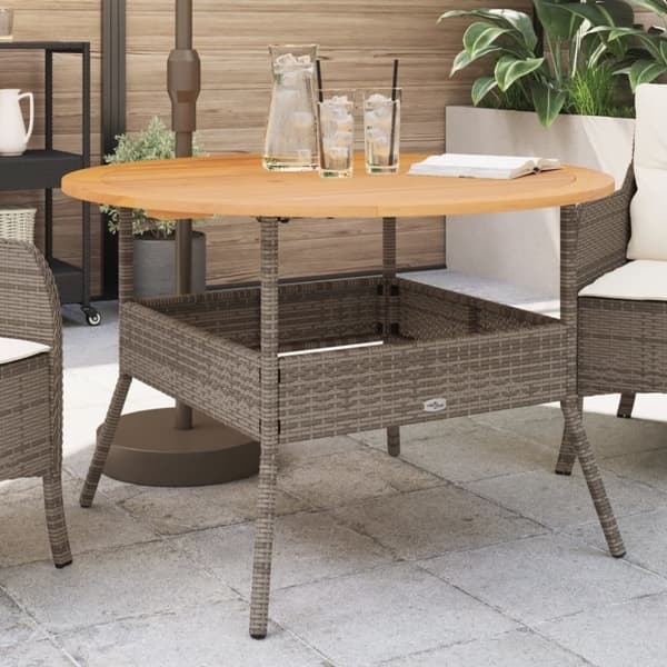 vidaXL Puutarhapöytä akasiapuu ja harmaa polyrottinki Ø110x71 cm