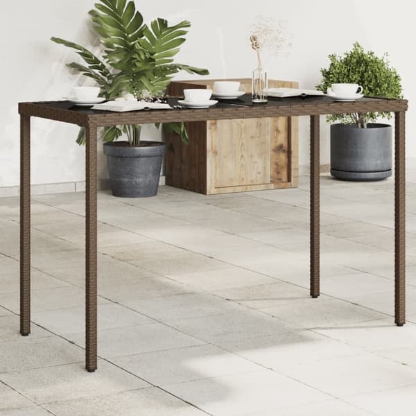 Trädgårdsbord med glasskiva brun 115x54x74 cm konstrotting