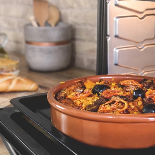 Cecotec Convection oven with rotisserie fork, 46 l capacity, and 12 cooking options.