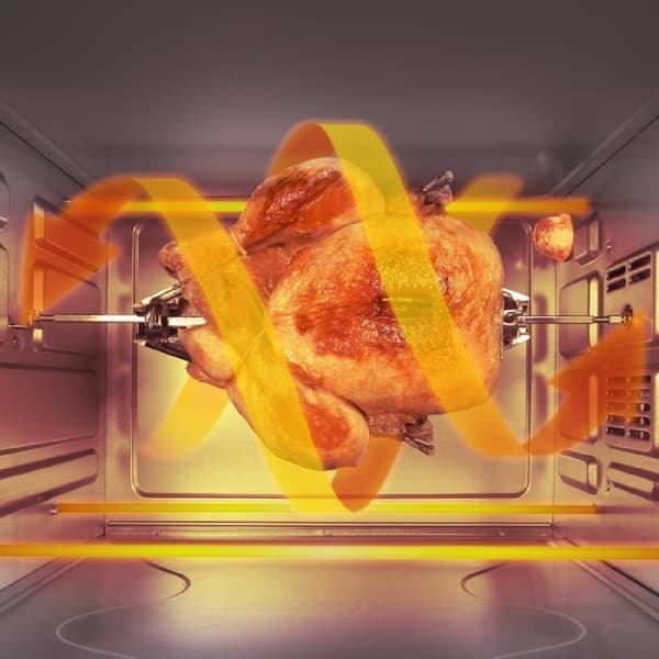 Cecotec Convection oven with rotisserie fork, 46 l capacity, and 12 cooking options.