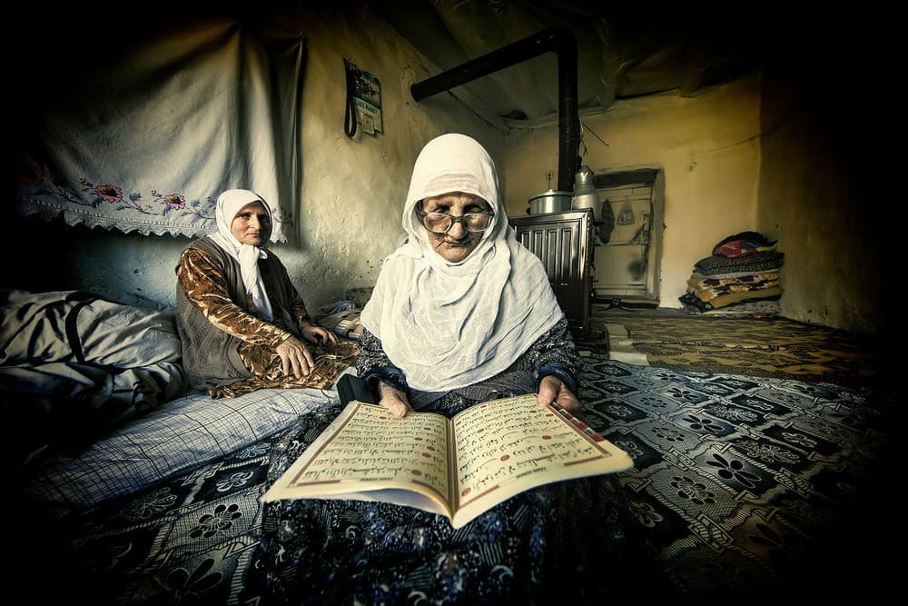 The Old Woman Is Reading The Koran. Poster