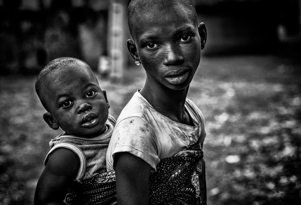 Taking Care Of Her Brother - Benin Poster