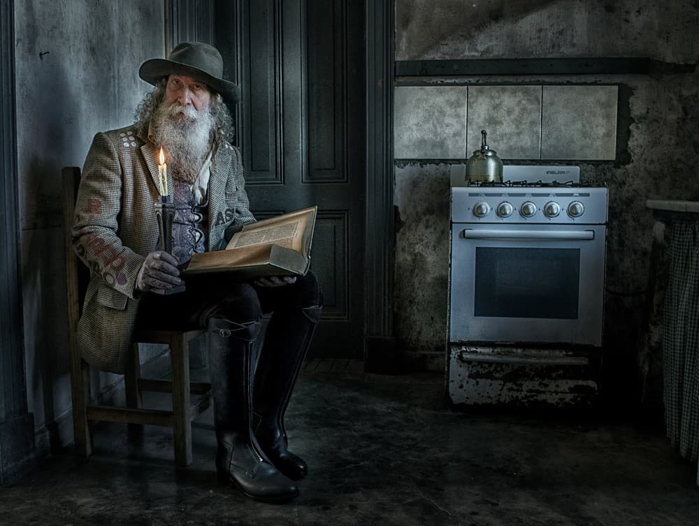 Reading In The Kitchen Poster