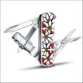 Miniatyrbild 2 av 3: Couteau Schweiz - VICTORINOX - Nagelklipp 580 - 8 Funktioner - Färg Edelweiss - 65 mm