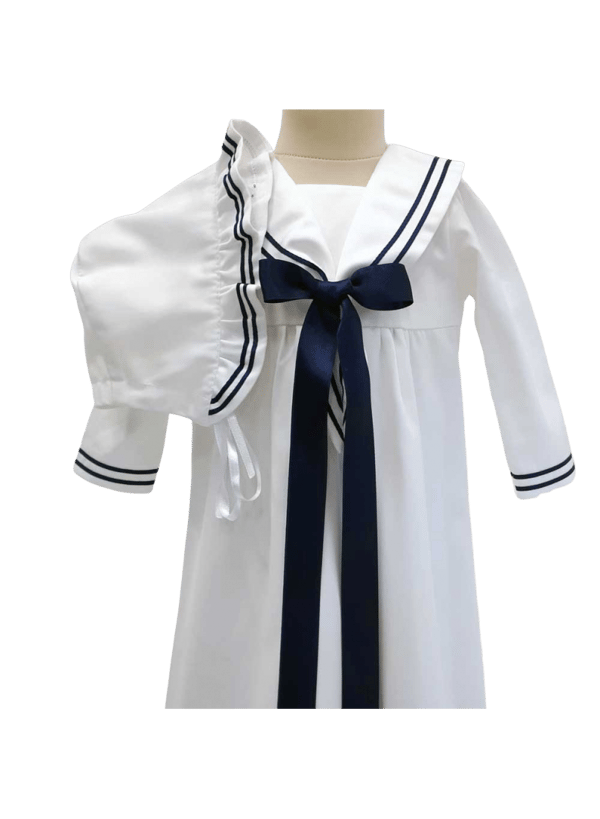 Christening gown with bow and bonnet in sailor style. Grace of Sweden
