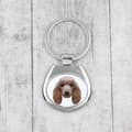 Miniatyrbild 3 av 3: Pudel - geometrisk nyckelring med ett foto och inskriptionen Art-Dog