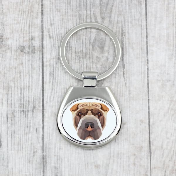 Shar Pei - geometrisk nyckelring med ett foto och inskriptionen Art-Dog