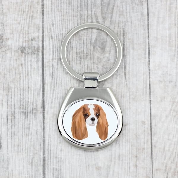 Cavalier King Charles Spaniel - geometrisk nyckelring med ett foto och inskriptionen Art-Dog