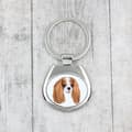 Miniatyrbild 3 av 3: Cavalier King Charles Spaniel - geometrisk nyckelring med ett foto och inskriptionen Art-Dog