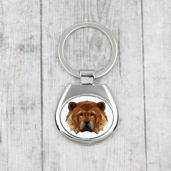 Chow Chow - geometrinen avaimenperä, jossa on valokuva ja kirjoitus Art-Dog