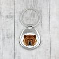 Pikkukuva 3 / 3: Chow Chow - geometrinen avaimenperä, jossa on valokuva ja kirjoitus Art-Dog
