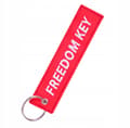 Miniatyrbild 1 av 6: FREEDOM KEY rött nyckelringhänge för nycklar Originalpresent