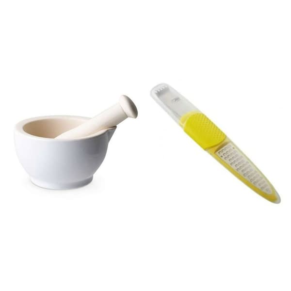 Vit stengodsmortel och mortelstöt + citronskal
