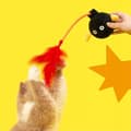 Pikkukuva 10 / 11: SAMMUTIN Kissanlelu höyhenillä ja kellolla, kestävä ja kestävä