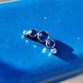Miniatyrbillede 2 af 2: Titanium labret klynge øreringe med blå zirkoner - sølv 1,2/6
