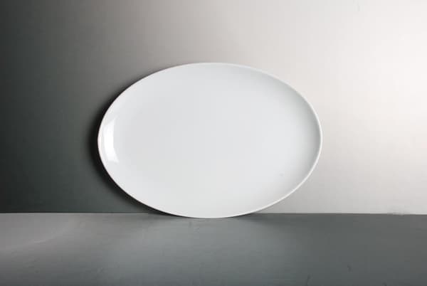 Stor porcelænstallerken - oval - 4-pakning