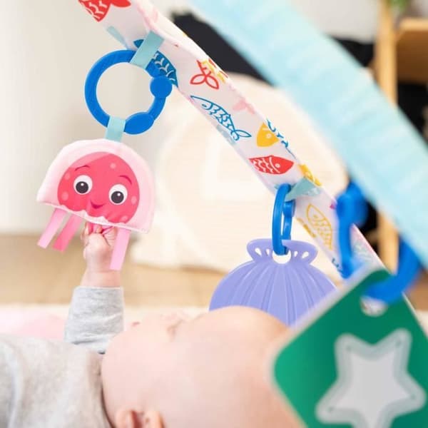 BABY EINSTEIN Lekmatta för spädbarn flicka 4-i-1 -Kickin’ Tunes- piano leksak, båge med sensoriska leksaker, flerspråkig