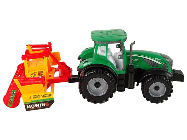 Grön traktor med orange kultivatordrift för barn