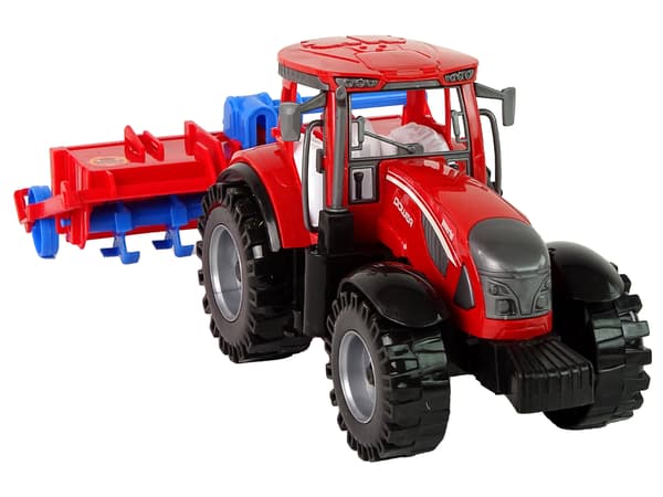 Röd traktor med friktionsdrivplog