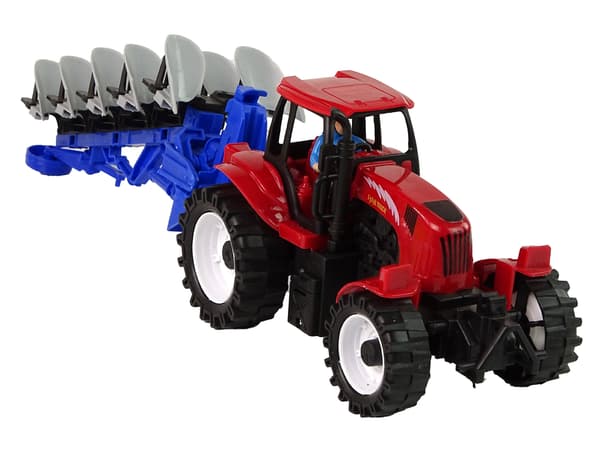 Röd traktor med ploggård