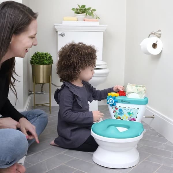BABY EINSTEIN Mini Toalett för barn med inkluderad toalettförminskare, musiksplash.