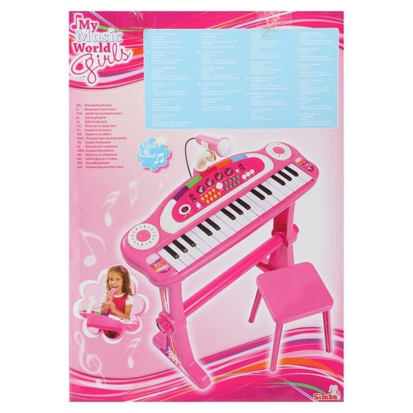 Musikklaviatur med rosa mikrofon