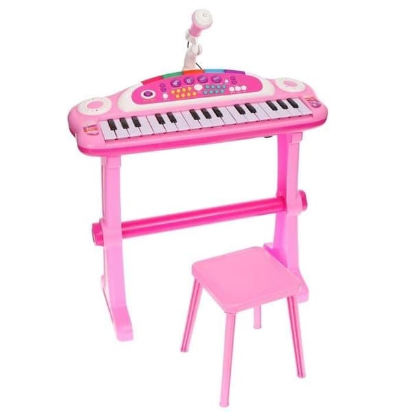 Musikklaviatur med rosa mikrofon