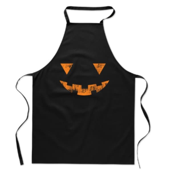 KØKKENFORKLEDE med HALLOWEEN-print Uhyggeligt sjovt græskarsmil
