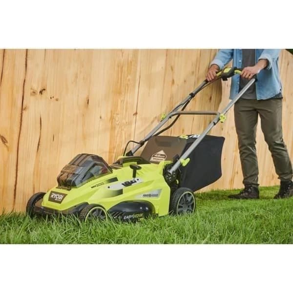 RYOBI - 36V MAXPOWER Power Assist™ Borstlös gräsklippare - klippning Ø 46 cm - uppsamling/mulching + 5 Ah batteri &amp; laddning. - RLM36X46H50PG