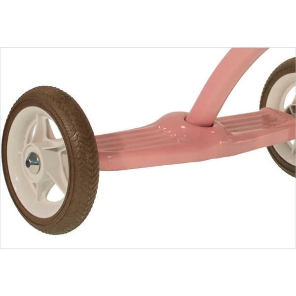 Rosa retro tjej trehjuling.