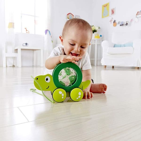 Hape - Tito grön dragleksak